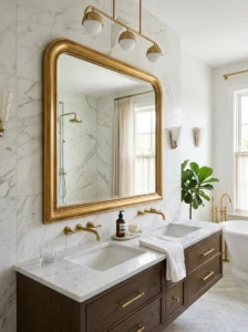 Gold framed mirror in bathroom