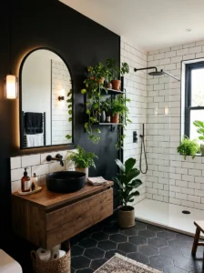 Bathroom with black accent wall and green decor accents