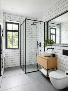 White tiles with black trim bathroom