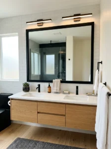 Oversized black mirror bathroom