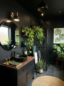 Black walls with green decor bathroom