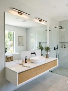 Oversized mirror in modern bathroom