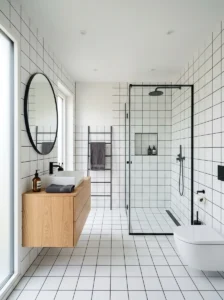 Minimal white tile bathroom with black grout
