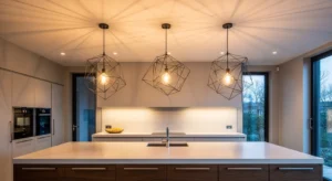 Geometric metal pendant lights over modern kitchen island