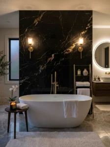 Black marble accent wall behind a white bathtub in a luxury bathroom