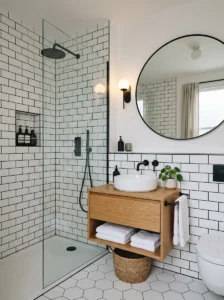 White tile bathroom with black grout lines and modern high contrast design