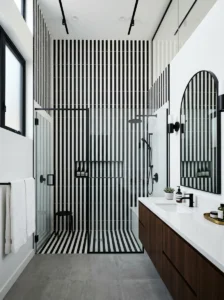 Vertical black and white tile bathroom design