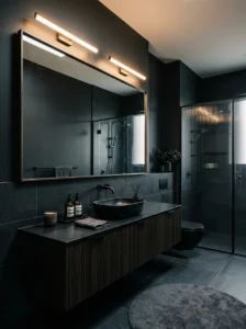 Large mirror making a black bathroom feel brighter and more open