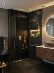 Black shower paired with gold fixtures for elegant contrast