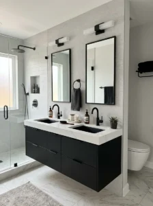 Black vanity with matte fixtures bathroom