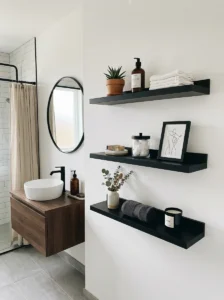 Black shelves on white wall bathroom design