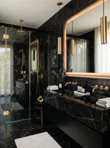 Black marble bathroom with gold fixtures and luxury modern design