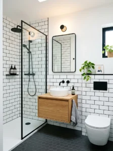 White subway tiles with black grout in a small bathroom