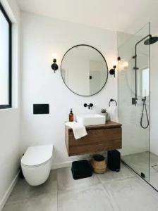 Black bathroom fixtures making a small bathroom feel modern and stylish