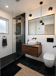 Small bathroom featuring black hexagon tile flooring